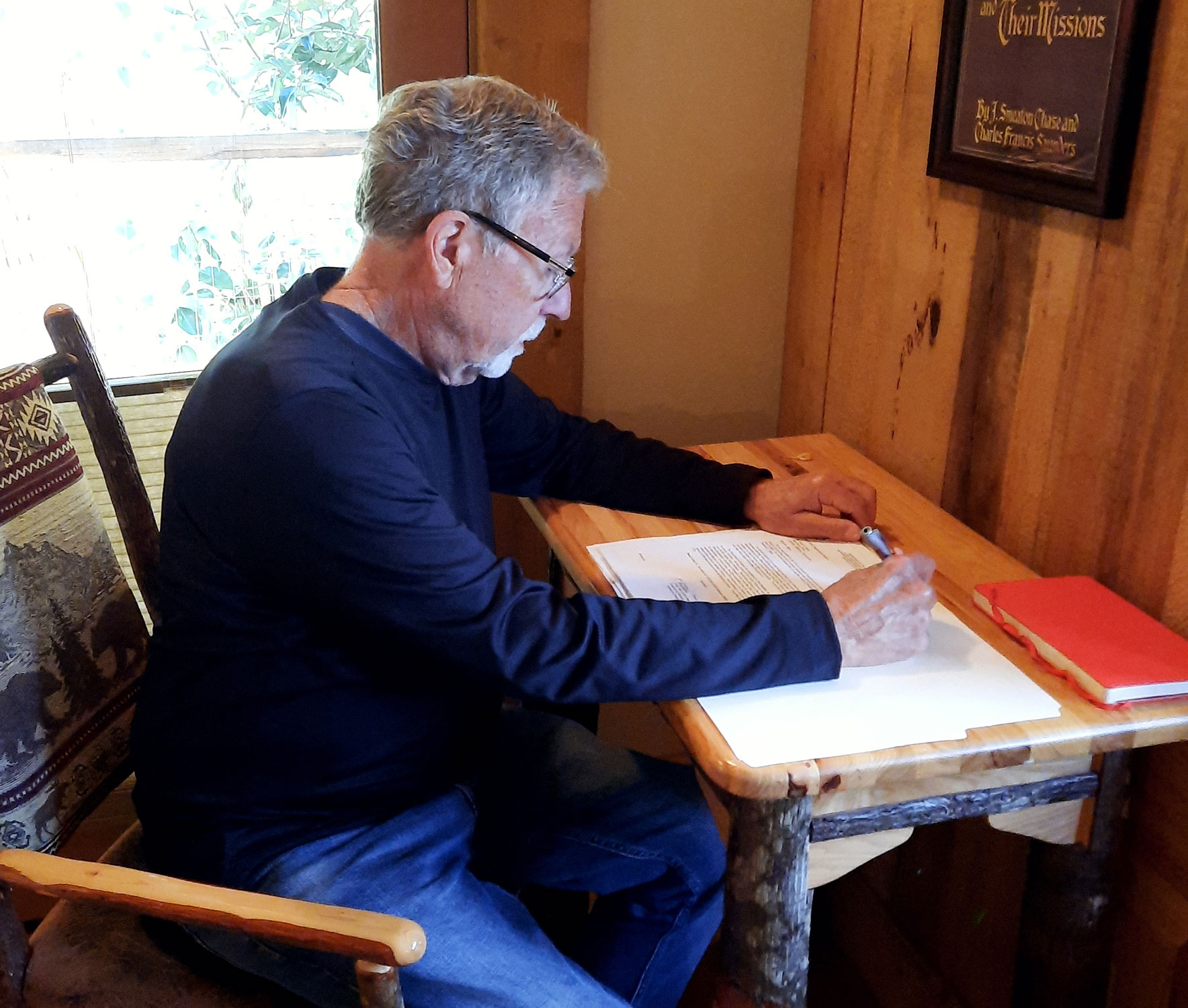 author-wayne-aronsen-at-desk